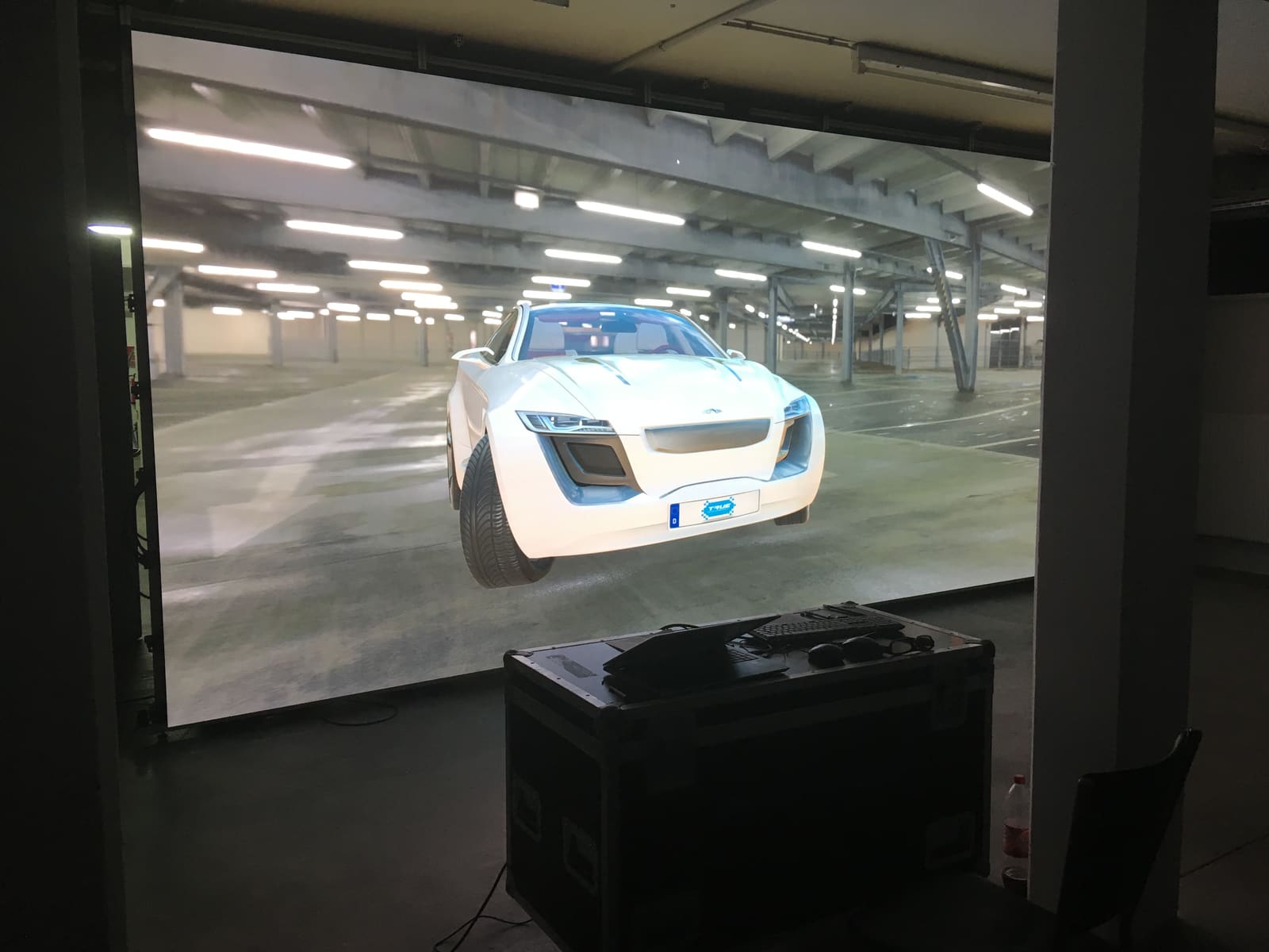 White concept car rendered at full scale on a TRUE dvLED design review dvLED wall