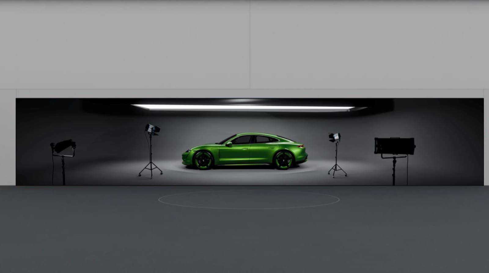 Green Porsche Taycan across a panoramic TRUE dvLED design studio dvLED wall